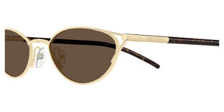 Alexander McQueen AM0563S women Gold Cat Eye Sunglasses
